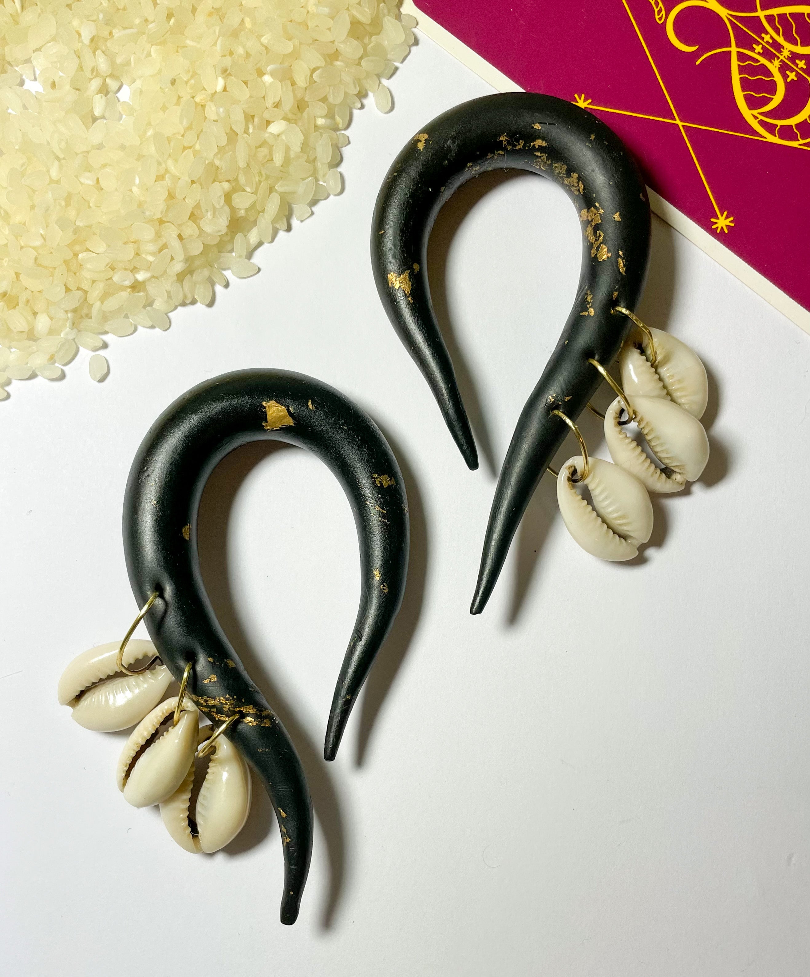 Hooked Cowrie Gauges